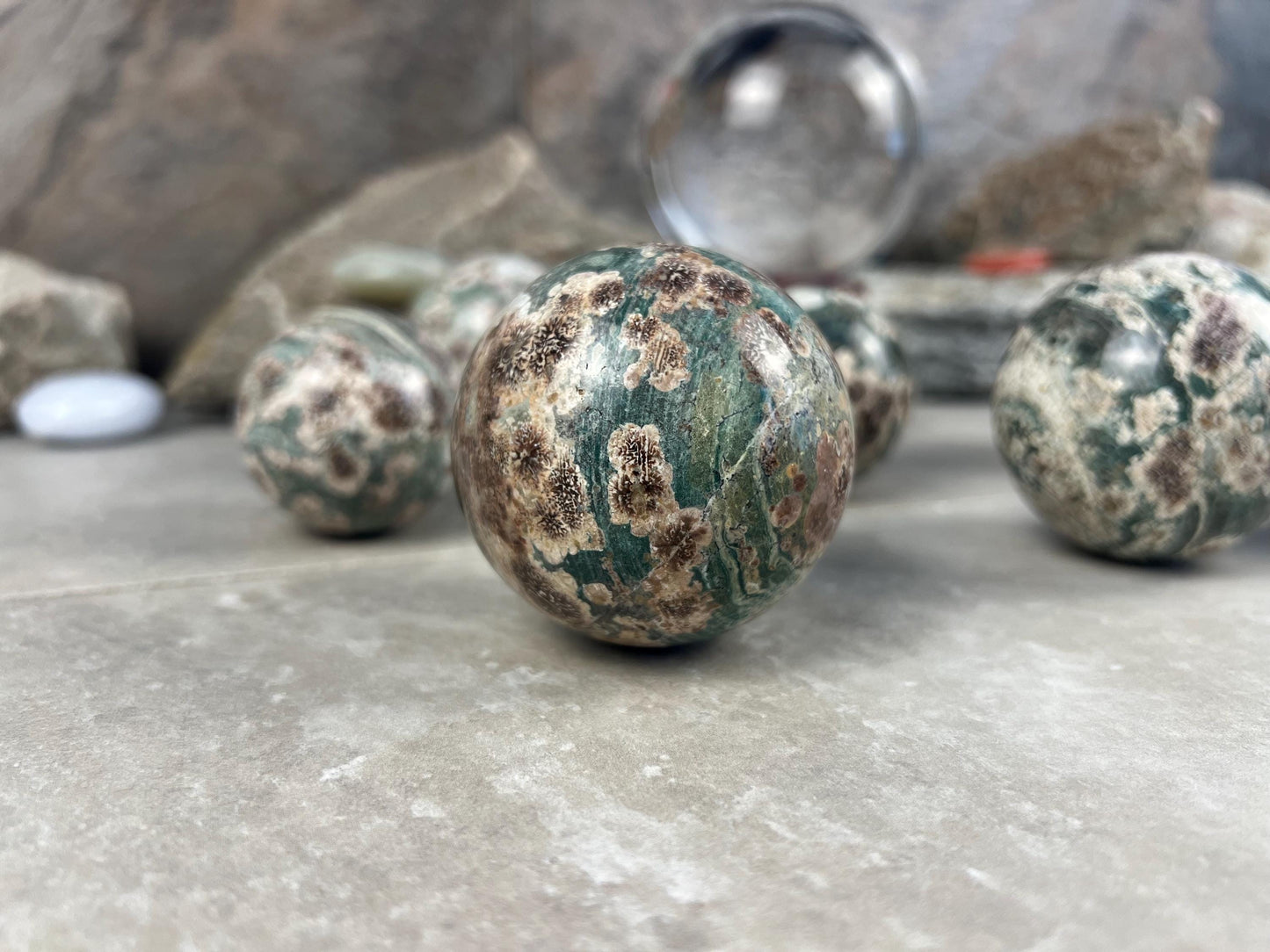 Polished Madagascan Flower Agate Sphere: Reflective Home Decor Stone