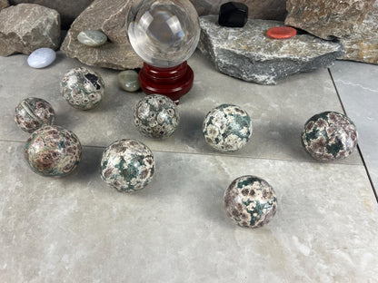 Polished Madagascan Flower Agate Sphere: Reflective Home Decor Stone