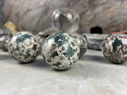 Polished Madagascan Flower Agate Sphere: Reflective Home Decor Stone