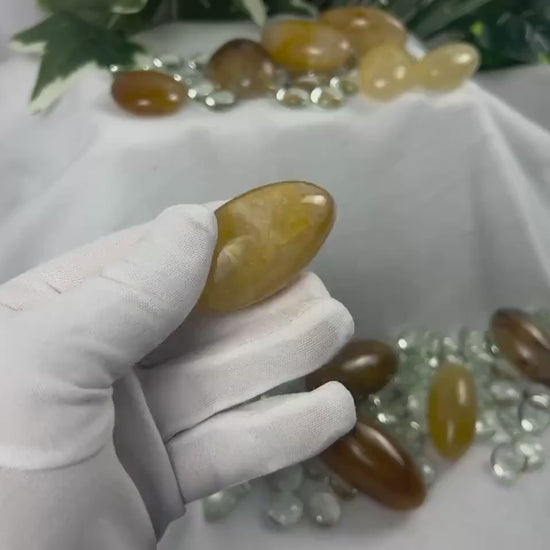 Arkansas Golden Healer Palm Stone: Cigar-Shaped Crystal for Stress Relief